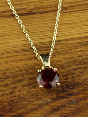 Granat Anhänger mit 750 Gelbgold